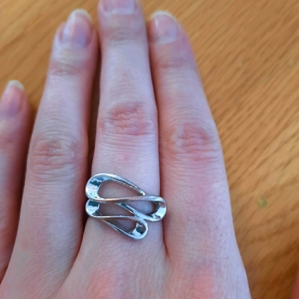 Silver colored ring 
